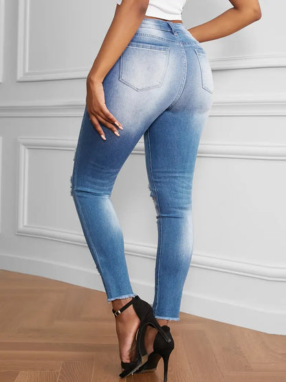 Vaqueros de mezclilla desgastados, de talle alto, rasgados y ajustados para mujer: ¡haga una declaración con jeans ajustados azules con dobladillo sin rematar! 