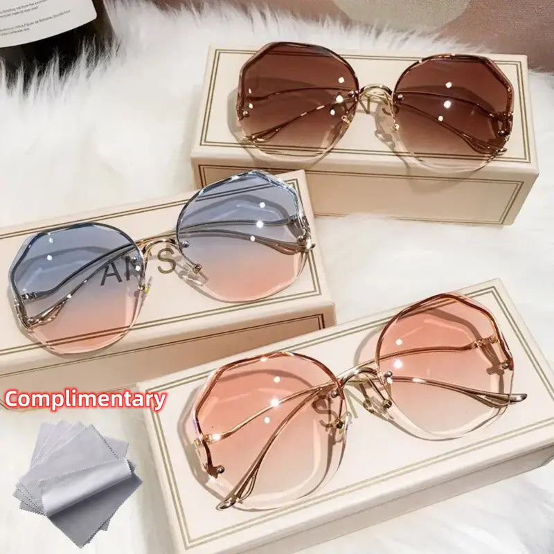 Stylish and Safe: Women's Rimless Cut Edge Sunglasses with UV Protection and Ocean Gradient Tea Pink Tint!