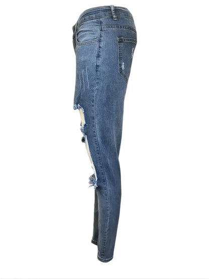 Women's Slim Fit Distressed Denim Jeans with Ripped Holes and Fishnet Stocking Accents