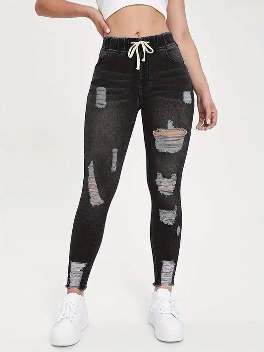 Jean skinny déchiré noir pour femme - Coupe slim, taille élastique et ourlet brut pour un style décontracté 