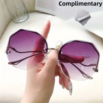 Stylish and Safe: Women's Rimless Cut Edge Sunglasses with UV Protection and Ocean Gradient Tea Pink Tint!