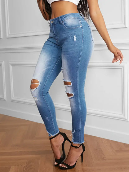 Vaqueros de mezclilla desgastados, de talle alto, rasgados y ajustados para mujer: ¡haga una declaración con jeans ajustados azules con dobladillo sin rematar! 