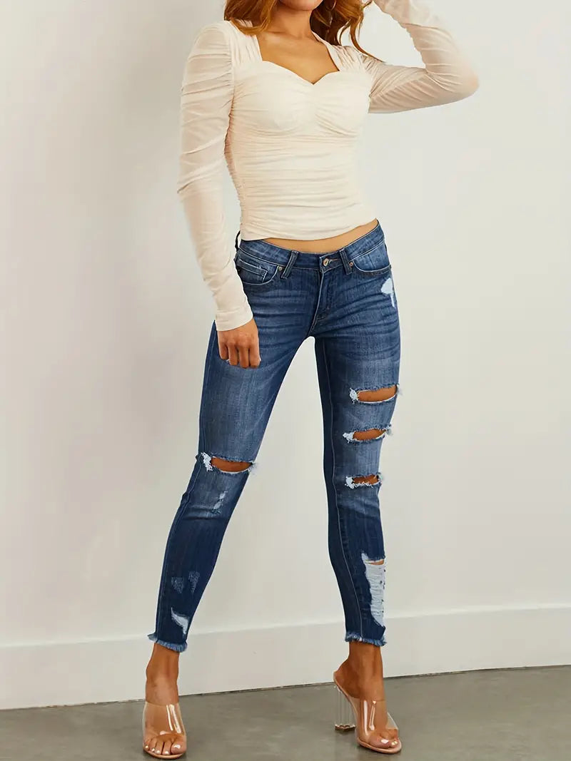 Women's Denim Jeans & Clothing: Ripped Raw Hem Distressed Cropped Jeans with Natural Waist & Slim Fit for a Casual Look