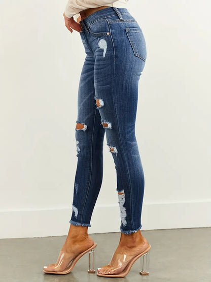 Women's Denim Jeans & Clothing: Ripped Raw Hem Distressed Cropped Jeans with Natural Waist & Slim Fit for a Casual Look