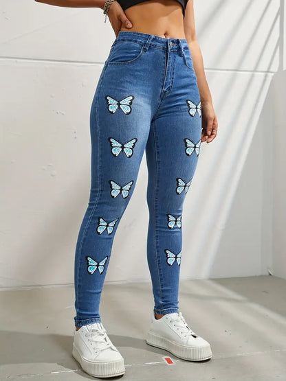 Women's Y2K Washed Blue Denim Jeans with Butterfly Print & High Stretch Skinny Fit - Slash Pocket Design