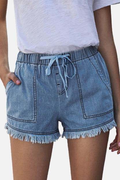 Short en denim effiloché avec poches