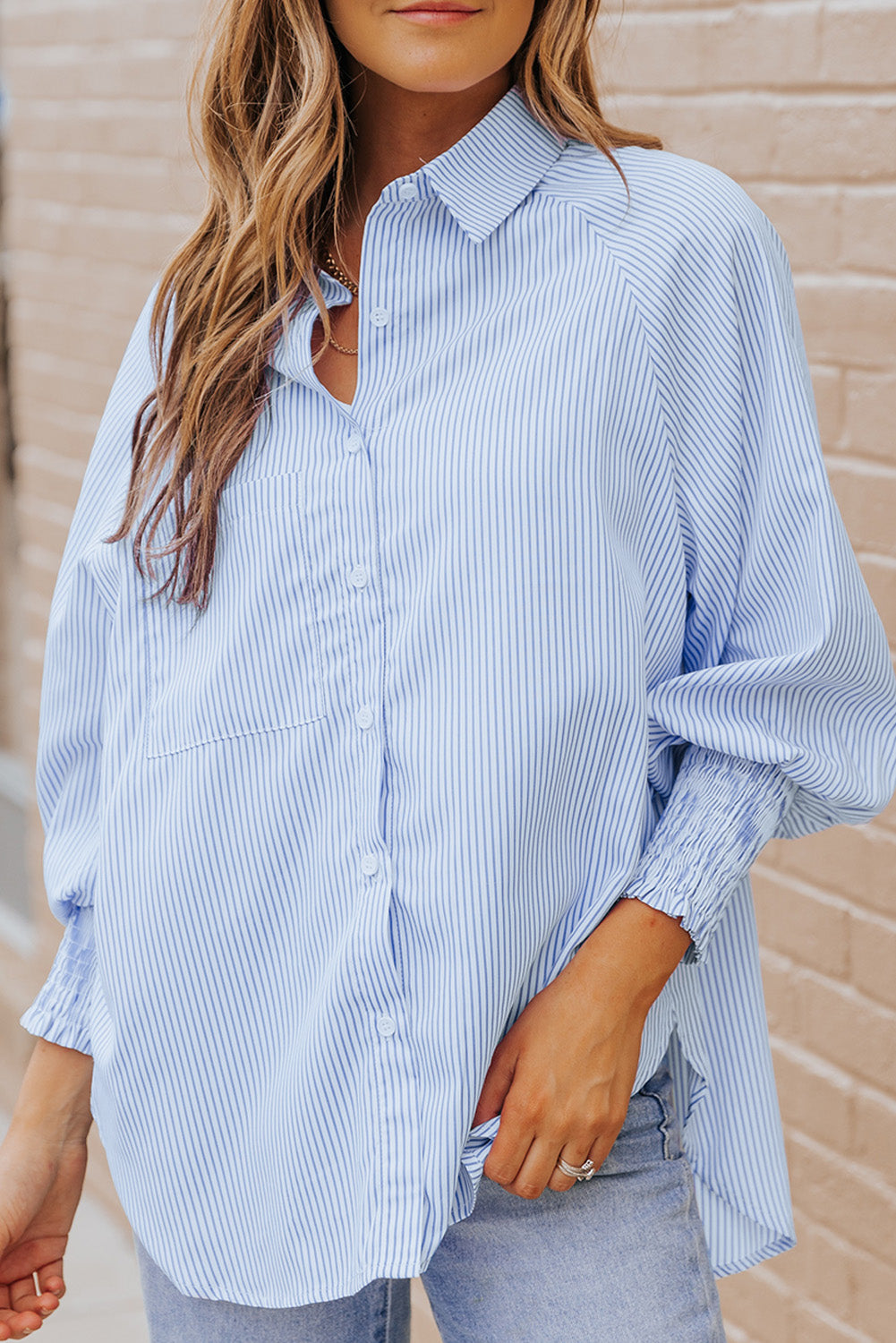 Camisa con cuello y mangas farol a rayas