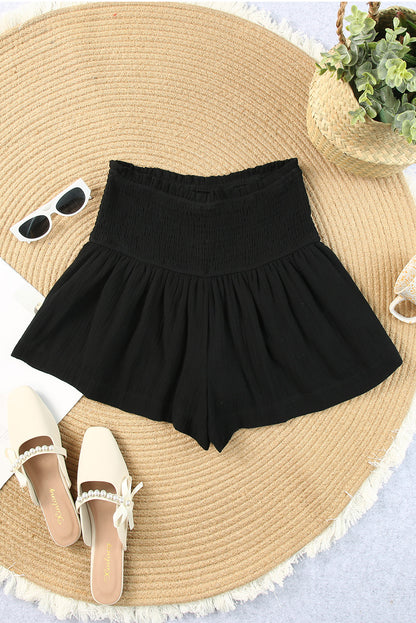 Short jupe-culotte smocké à taille