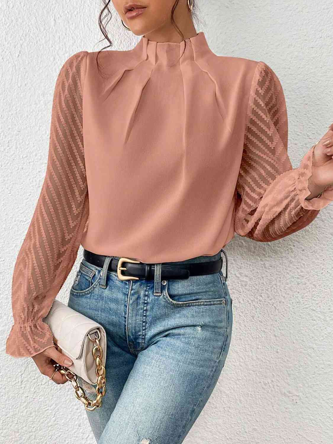 Blouse à manches volantées et col montant