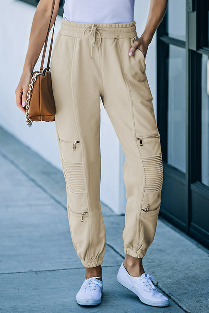 Pantalon de jogging avec cordon de serrage et poches à détail zippé à la taille