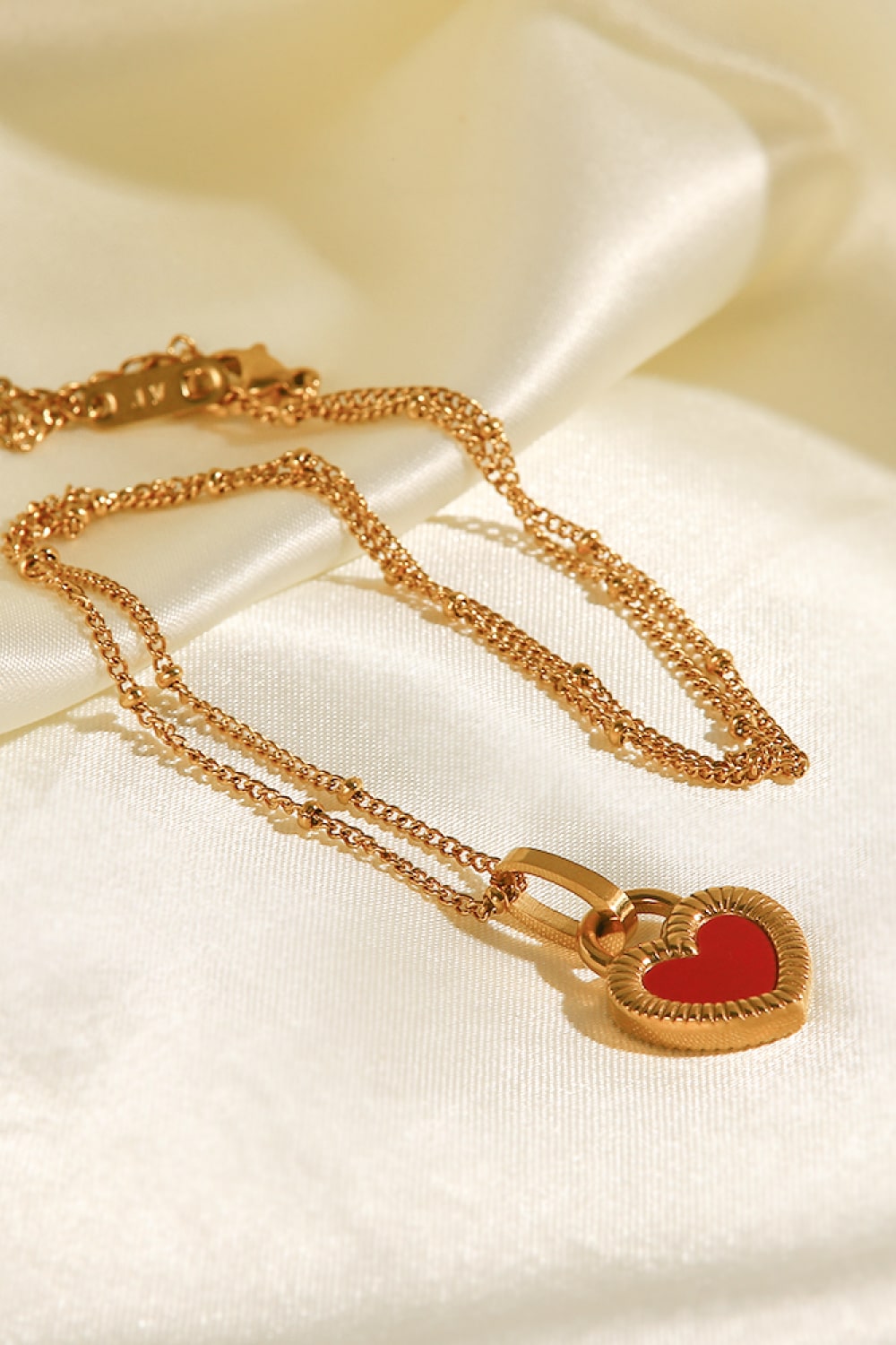 Collier pendentif coeur en acier inoxydable