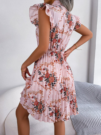 Robe plissée à imprimé floral et col noué, longueur aux genoux