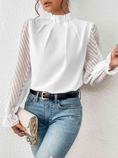 Blouse à manches volantées et col montant