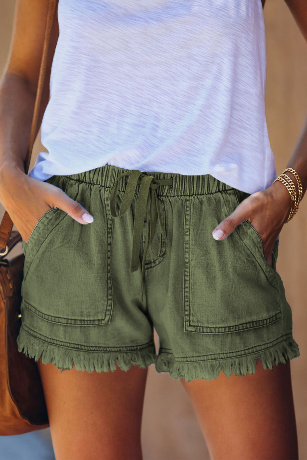 Short en denim effiloché avec poches