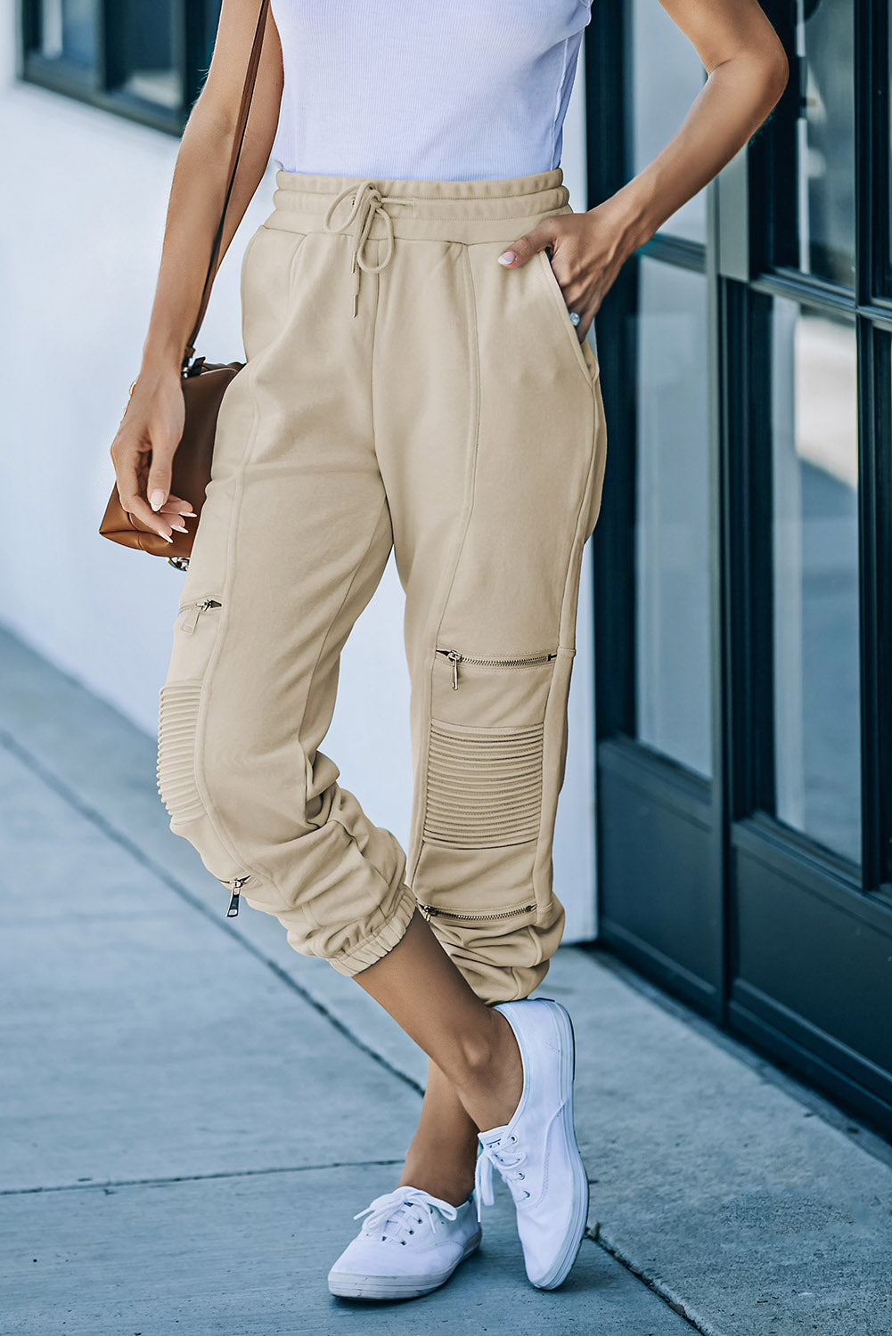 Pantalon de jogging avec cordon de serrage et poches à détail zippé à la taille