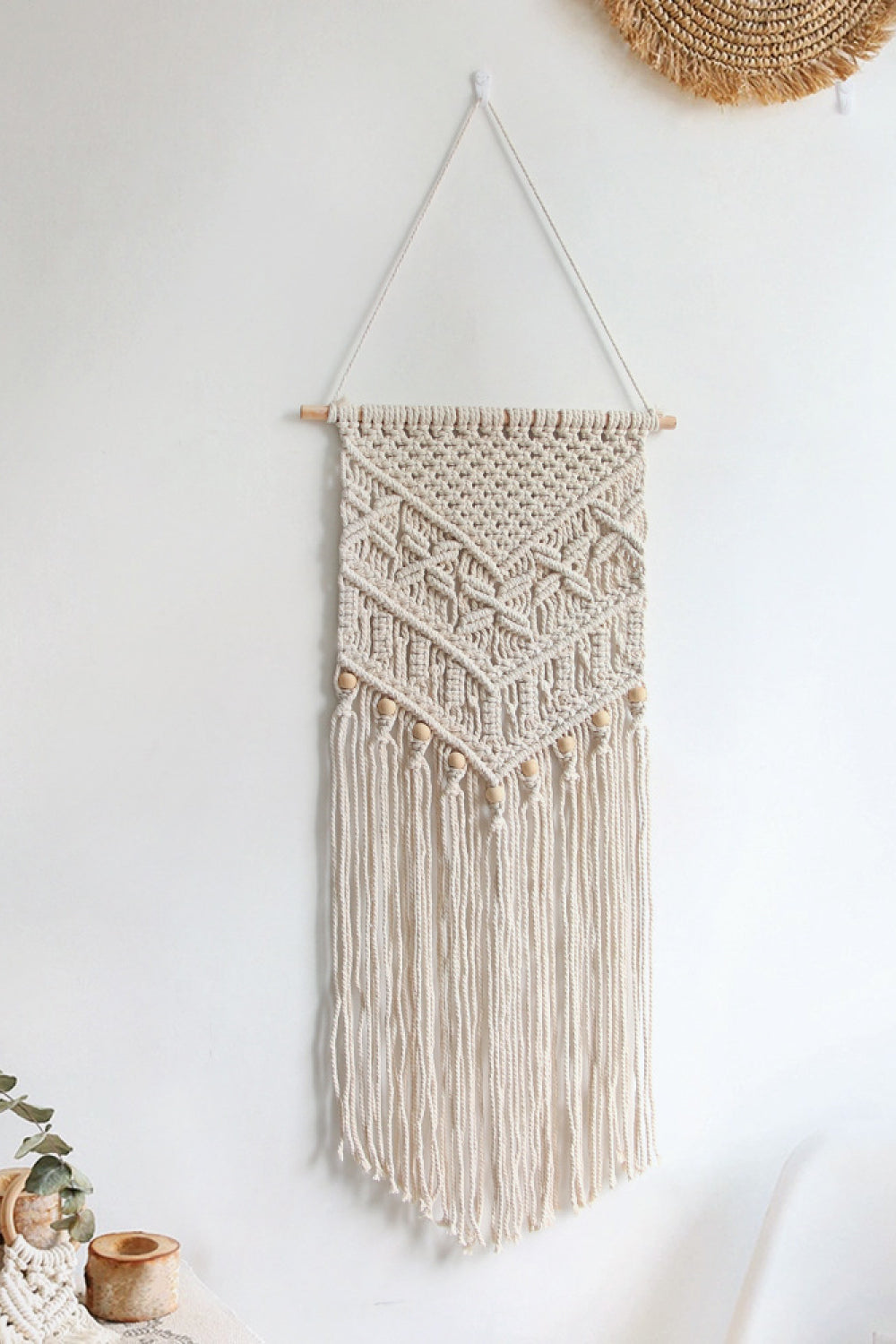 Colgante de pared con flecos de macramé