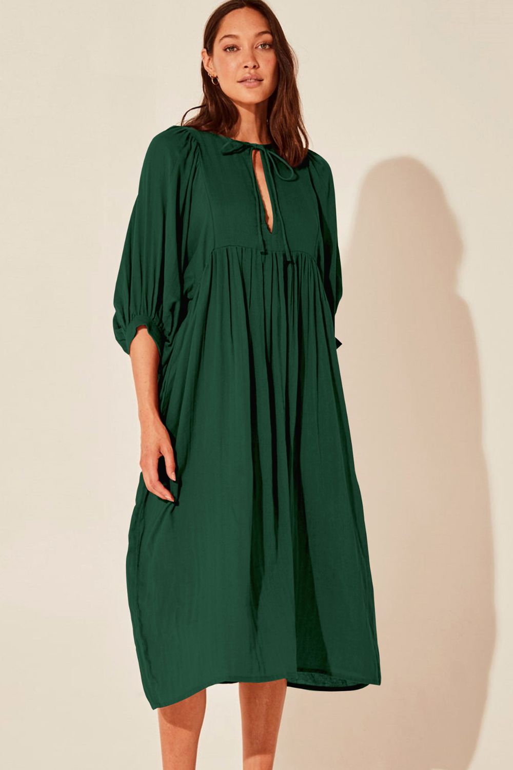 Robe mi-longue à manches lanternes et col noué