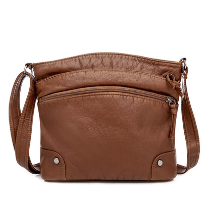 Stylish and Versatile Multi-Pocket Shoulder Bag with Faux Leather and Studded Decor - Perfect for Women on the Go