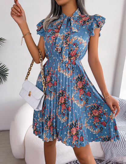 Robe plissée à imprimé floral et col noué, longueur aux genoux