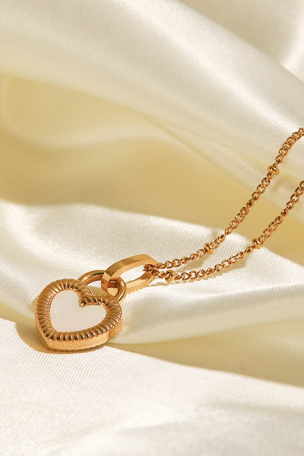 Collier pendentif coeur en acier inoxydable