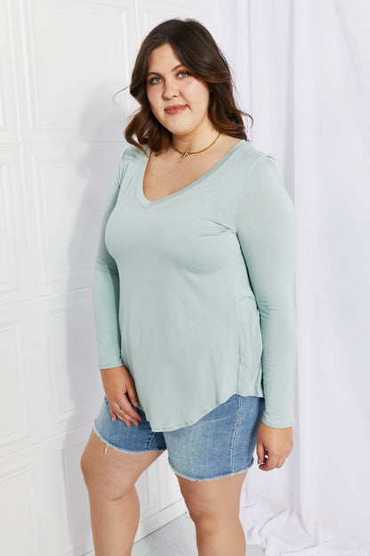 Zenana Full Size V-Neck Curved Hem Top in Light Green