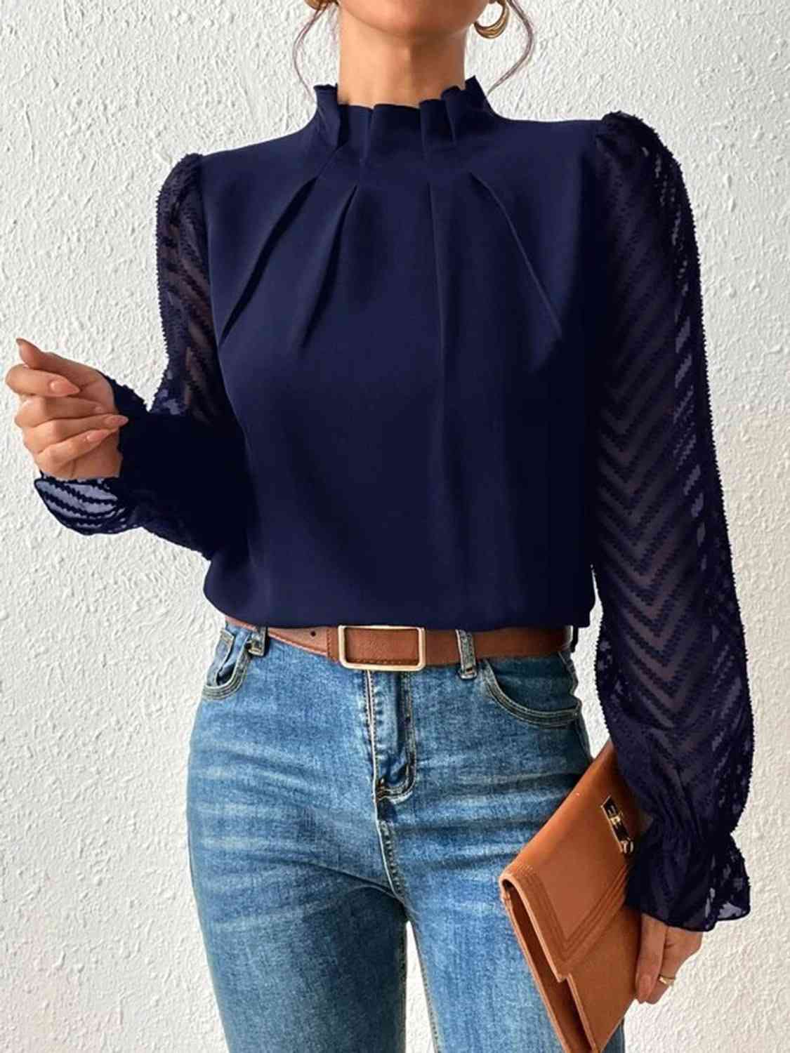 Blouse à manches volantées et col montant