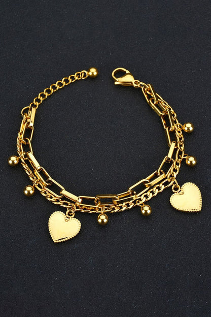 Pulsera de acero inoxidable con dije de corazón