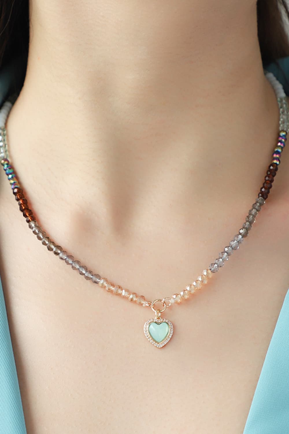 Collier de perles avec pendentif coeur