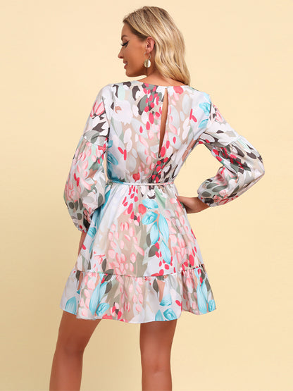 Robe surplis imprimée à taille nouée et manches bouffantes