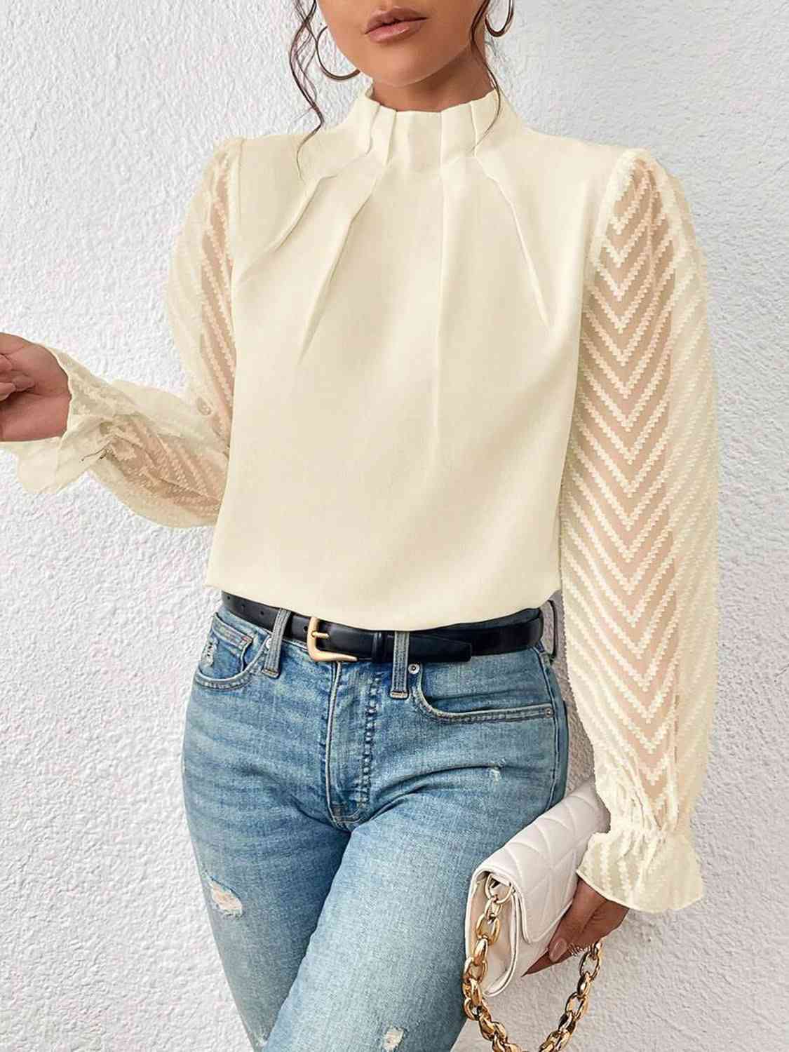 Blouse à manches volantées et col montant