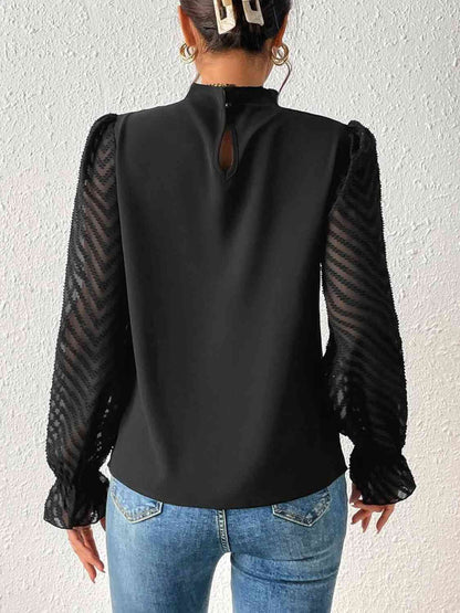 Blouse à manches volantées et col montant