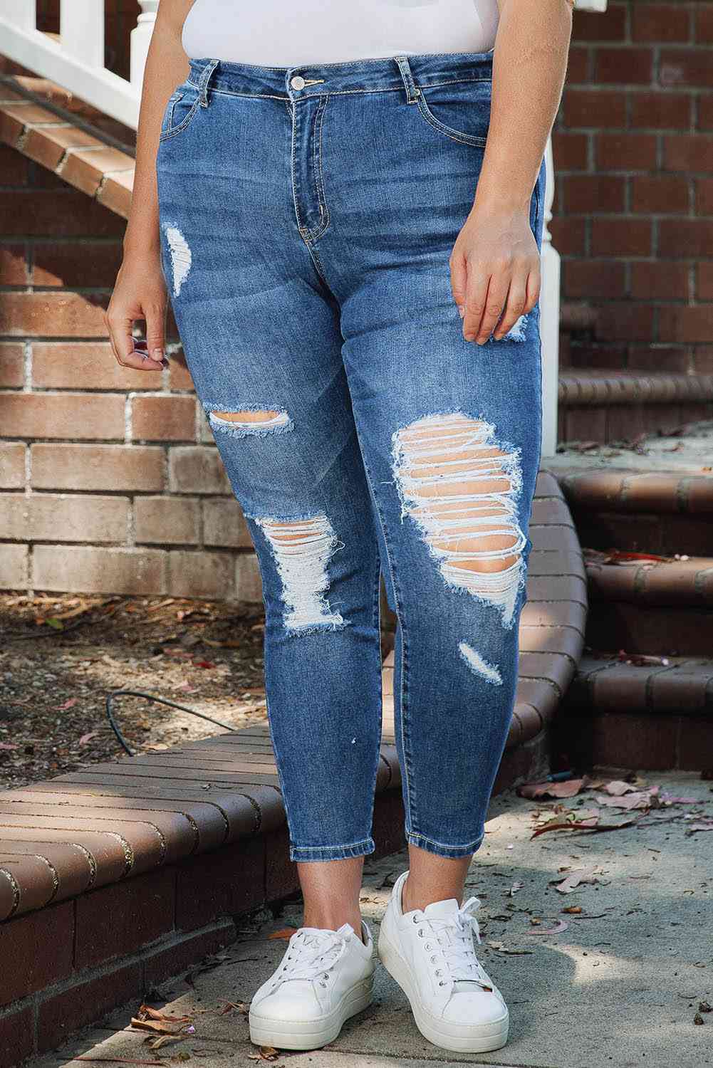 Jean skinny effet vieilli de grande taille