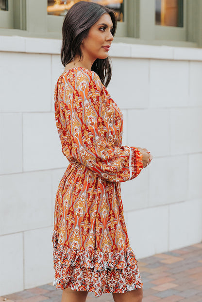 Vestido estampado con borlas y mangas globo