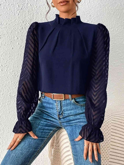 Blouse à manches volantées et col montant