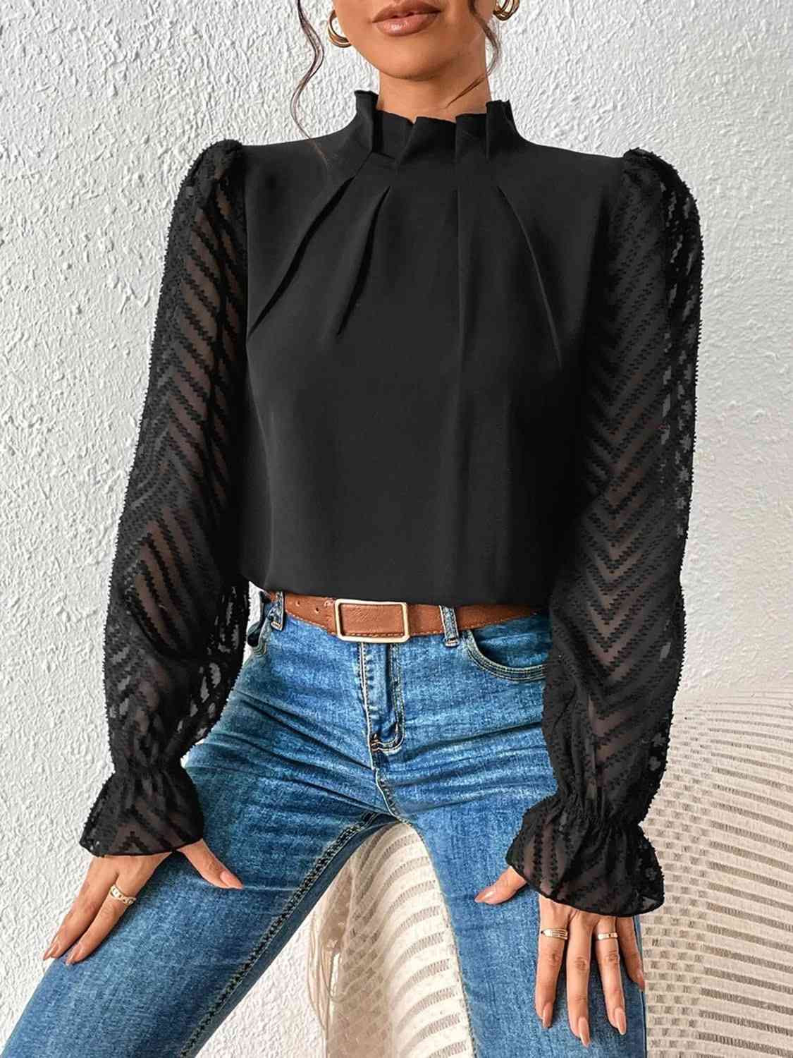 Blouse à manches volantées et col montant