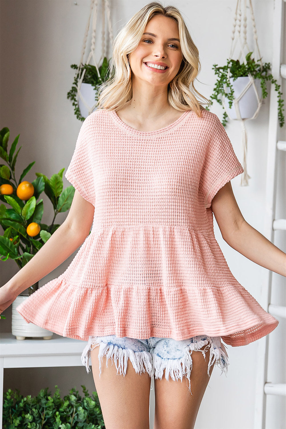 Waffle-Knit Buttoned Ruffle Hem Top