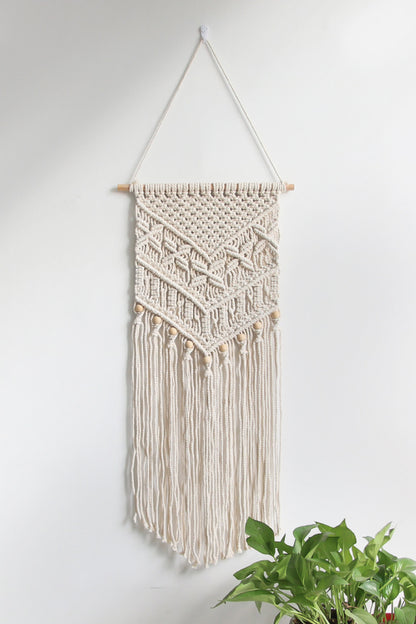 Colgante de pared con flecos de macramé