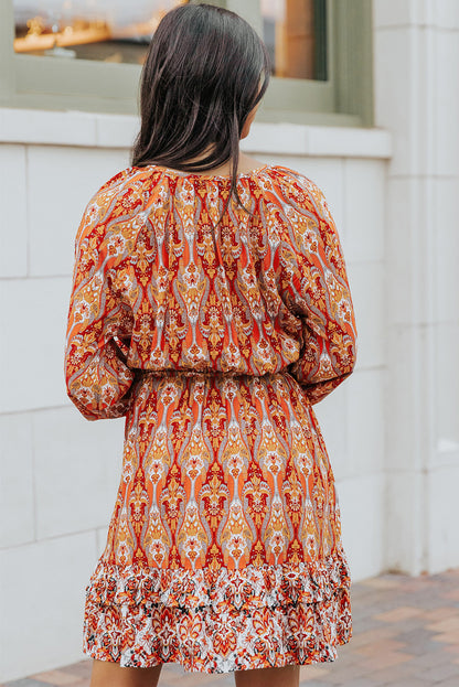 Vestido estampado con borlas y mangas globo