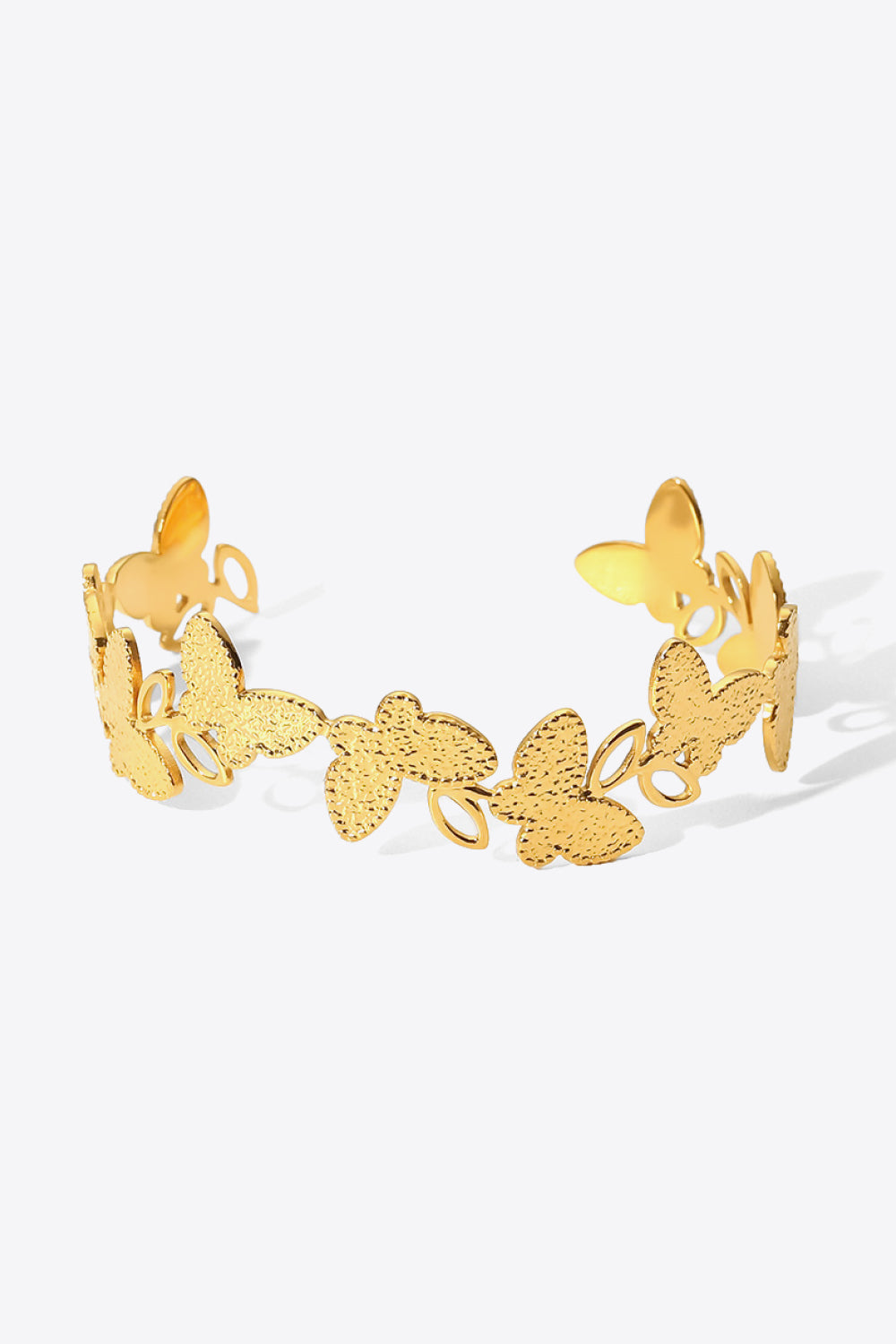 Pulsera abierta en forma de mariposa