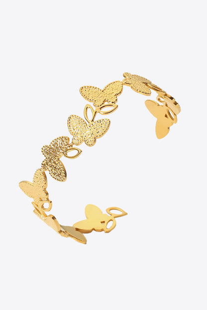 Pulsera abierta en forma de mariposa